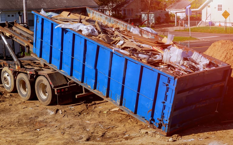 Construction debris container being filled